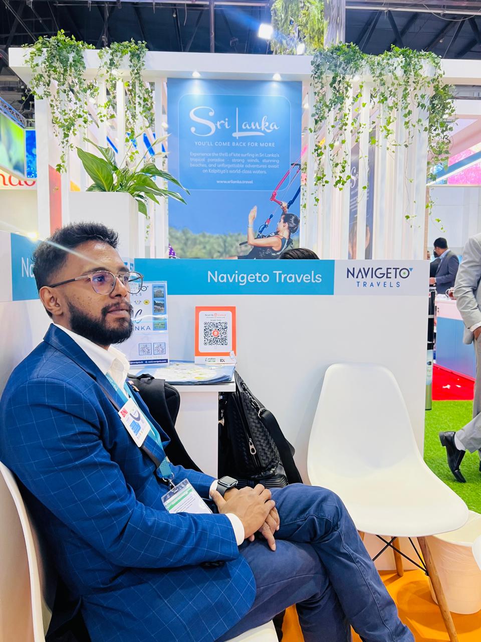 Mohamed Innam Muzzammil Abdul Kudthoos at the Navigeto Travels exhibition stand